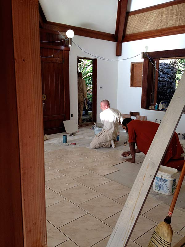 Kulapati Satya Palani Guides Tiling Work